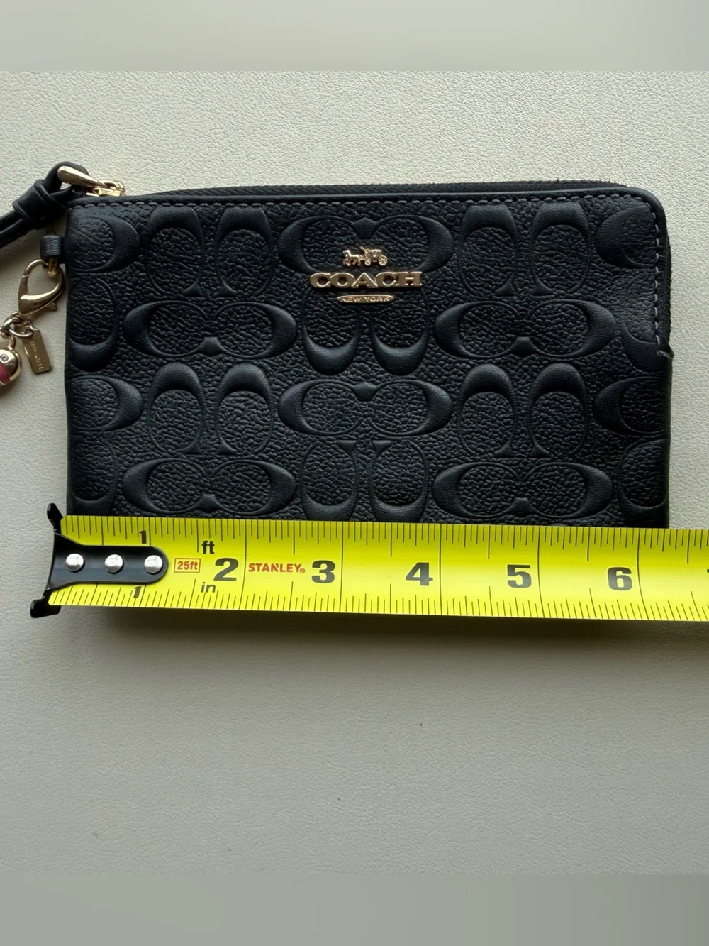 Coach Black Embossed Signature Wristlet with Gold Logo